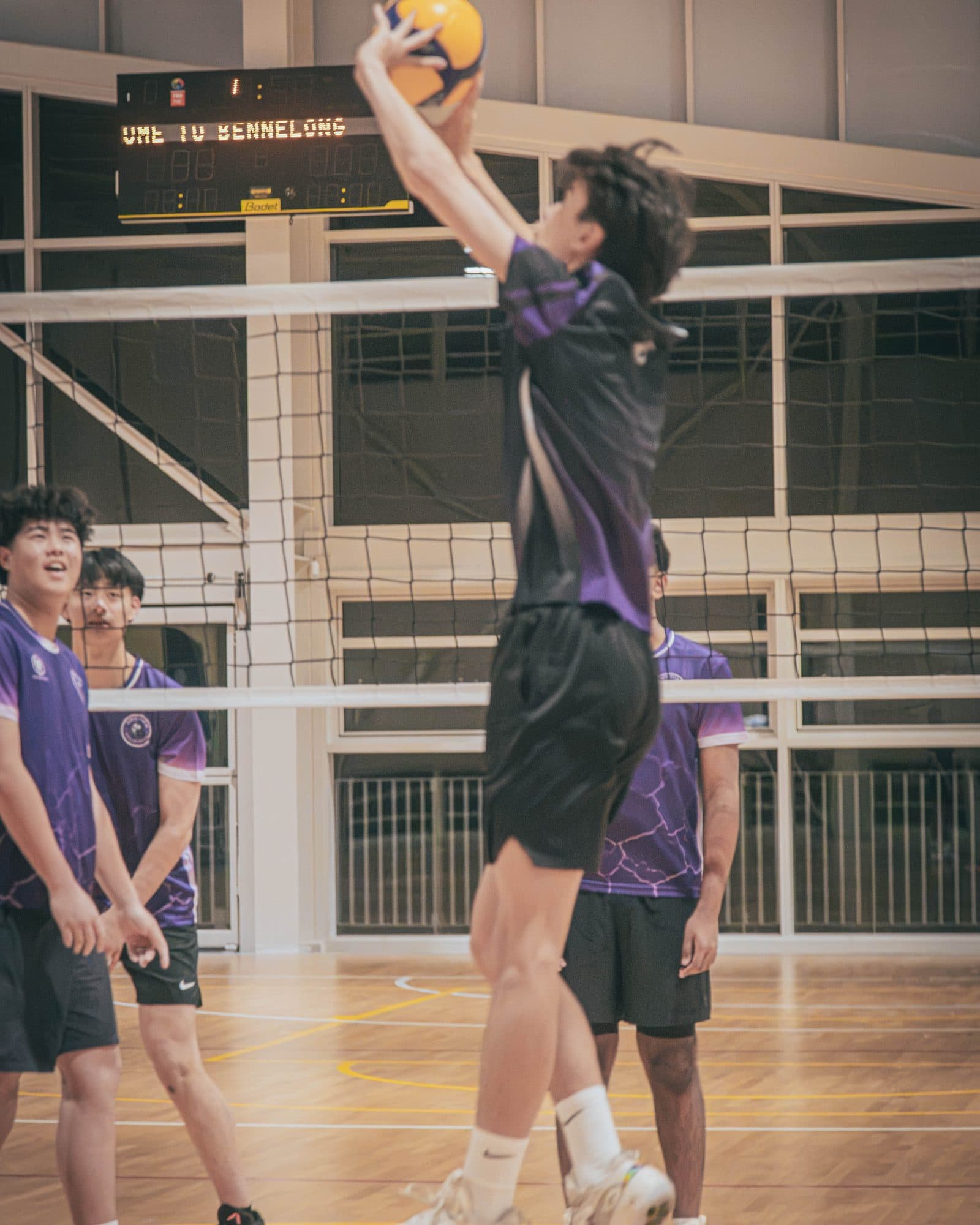 Performance Squad players in purple Obsidian shirts playing together at West Ryde